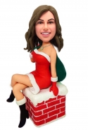 Custom Christmas girl bobblehead sitting on the chimney